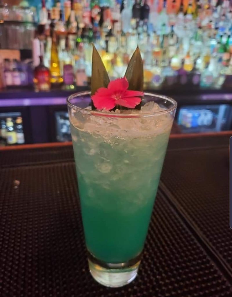 Blue Lagoon - 4-Year-Old Flor de Cana Rum, Smith and Cross Overproof Rum, Blue Curacao, House-Made Orgeat, Roasted Pineapple Syrup, Pineapple Juice